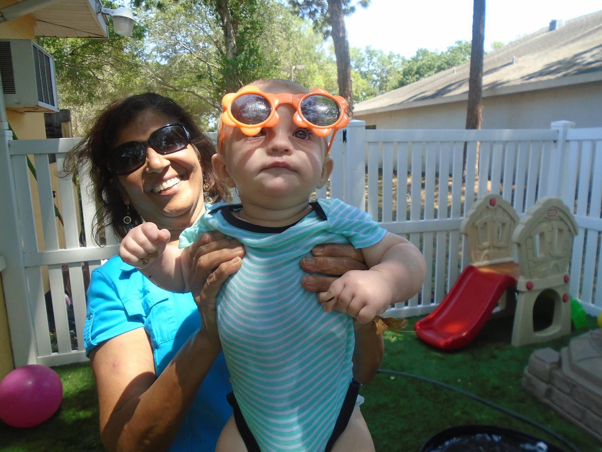 Adult and young child together in Toad Hall's outdoor area
